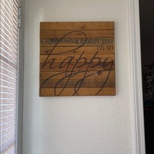 Do what makes you oh-so happy sign.